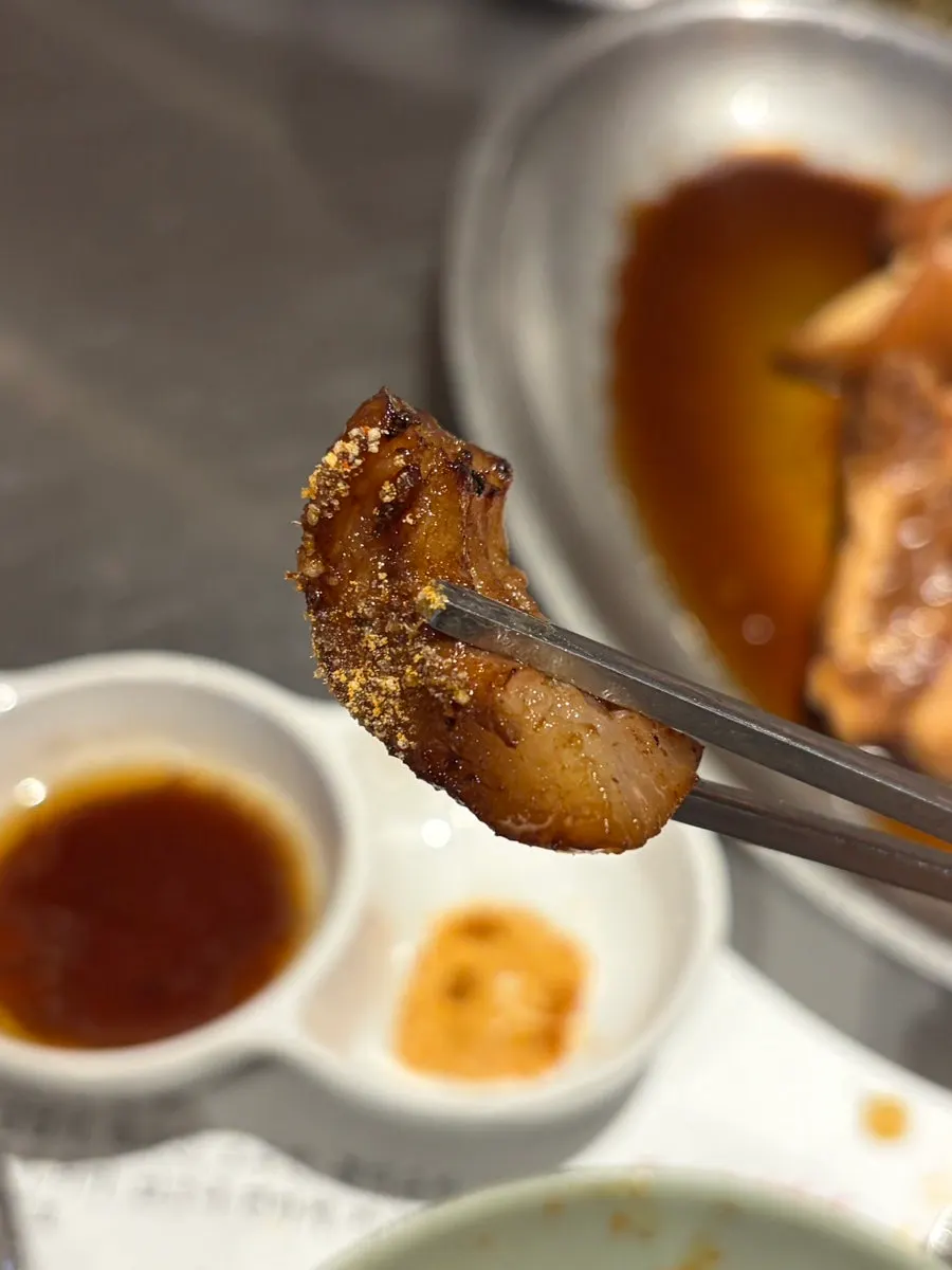Close-up of the tail cut's thick, chewy texture