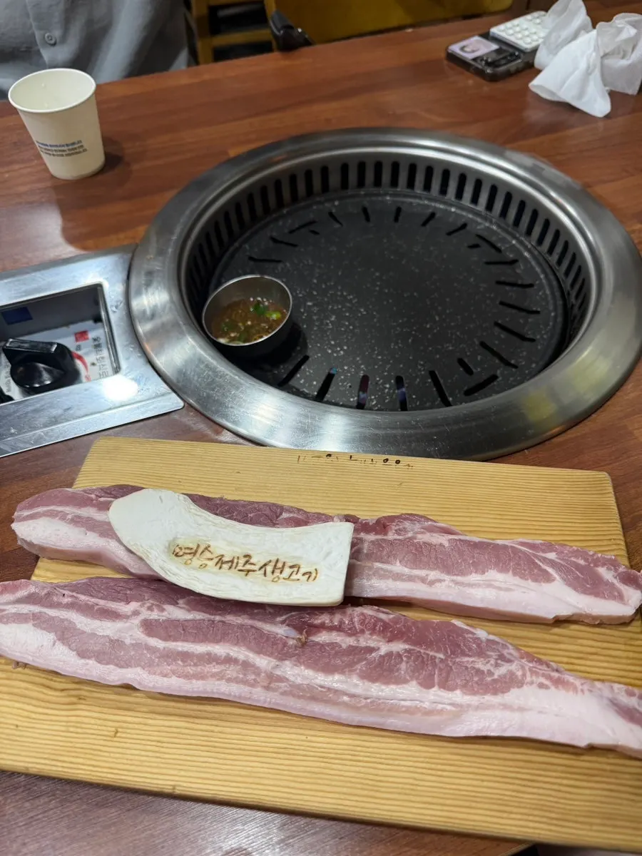 Meat table setting at a Jeju-style pork specialty restaurant