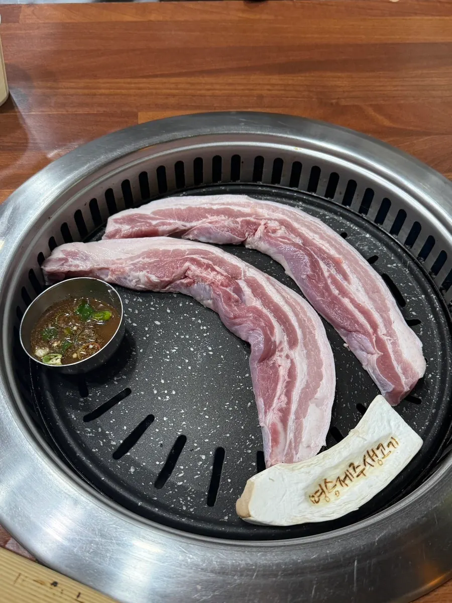 Three thick-cut portions of meat