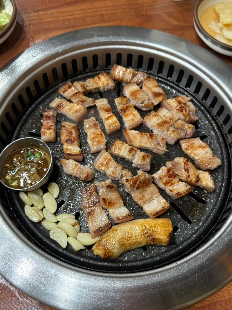 Meal with kimchi jjigae and gogi guksu
