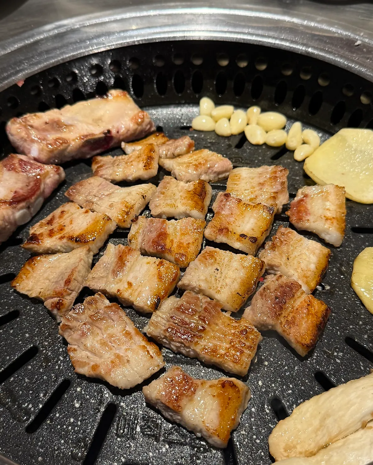 Nicely browned raw ribs at Haean Sutbul Galbi in Gwangalli