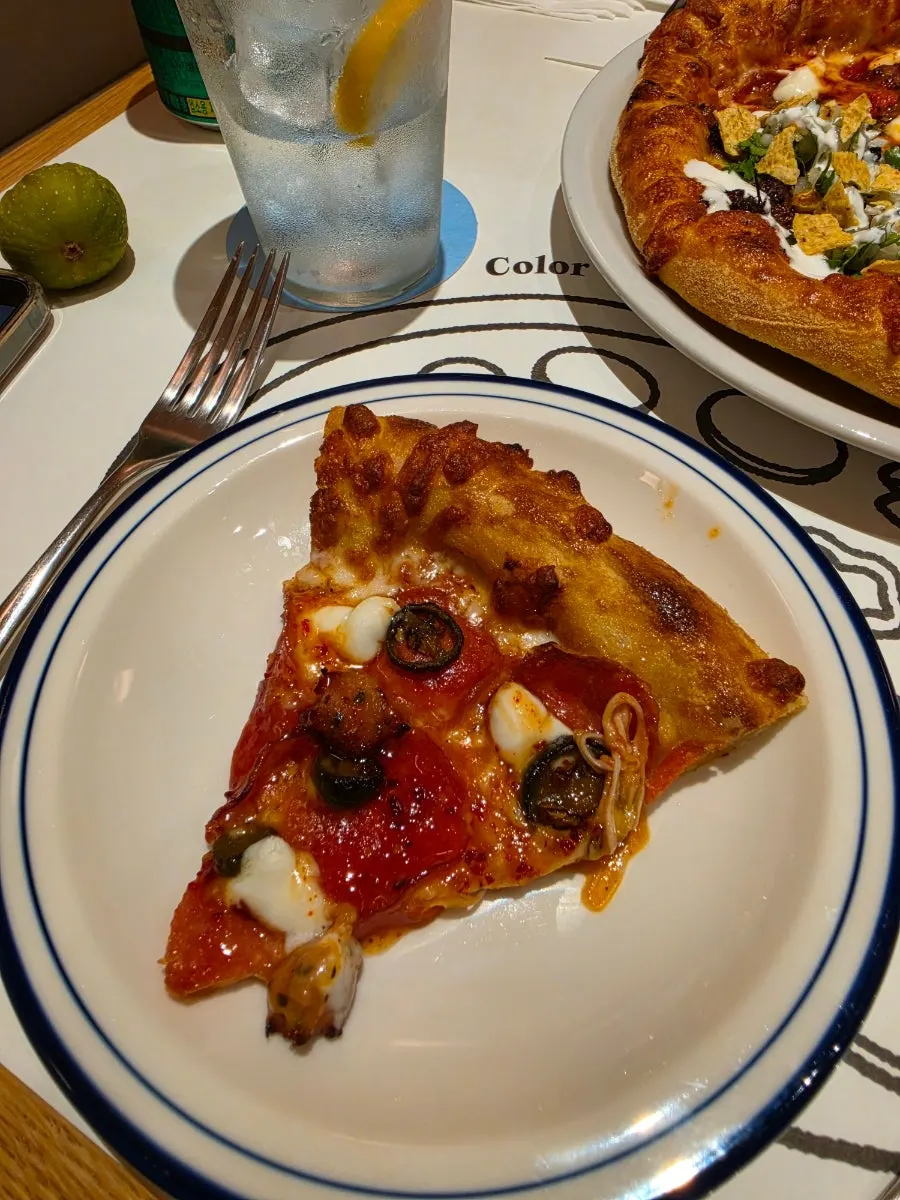 Hot Honey Pepperoni and Birria Taco half-and-half pizza
