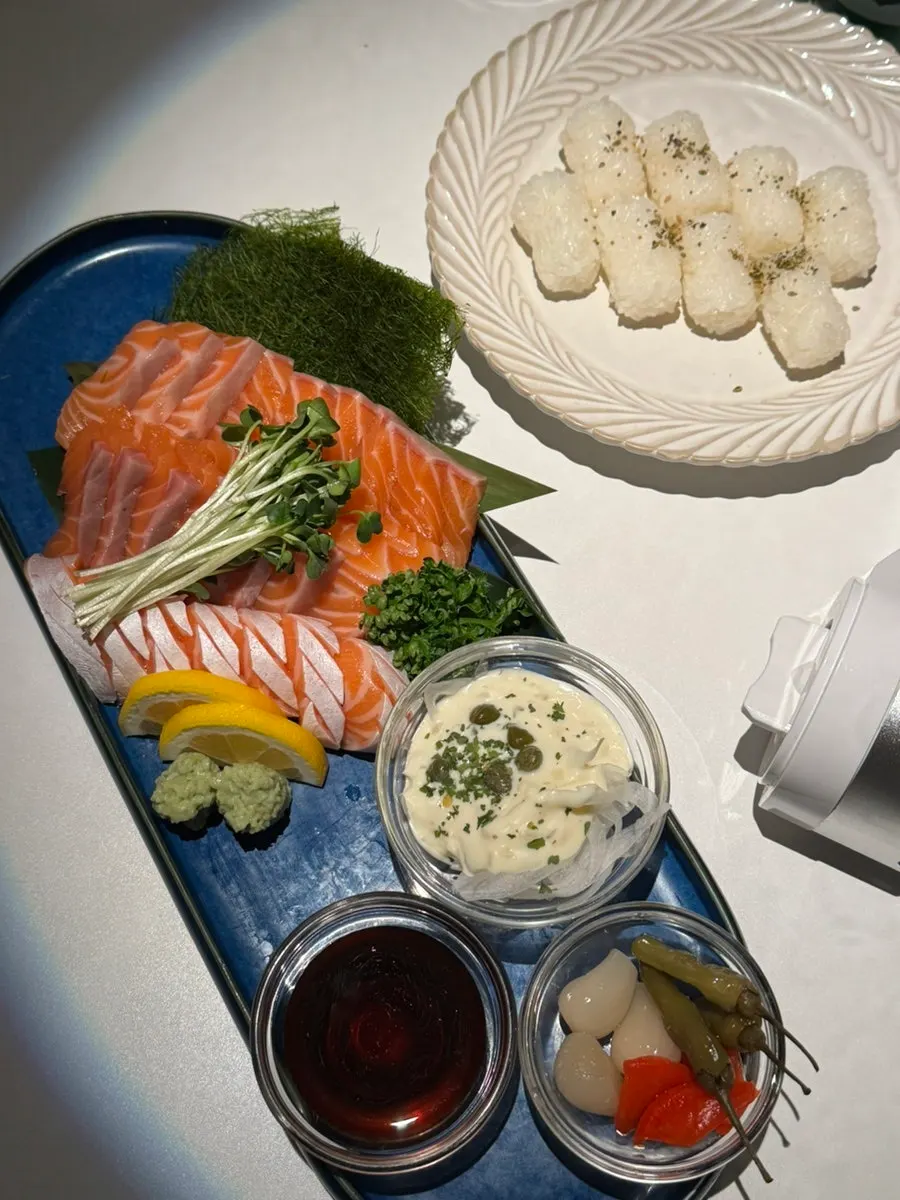 Close-up of thickly sliced salmon sashimi