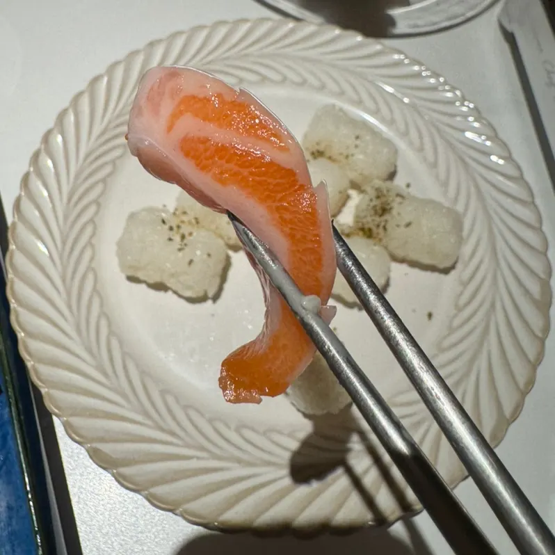A fatty piece of salmon belly meat