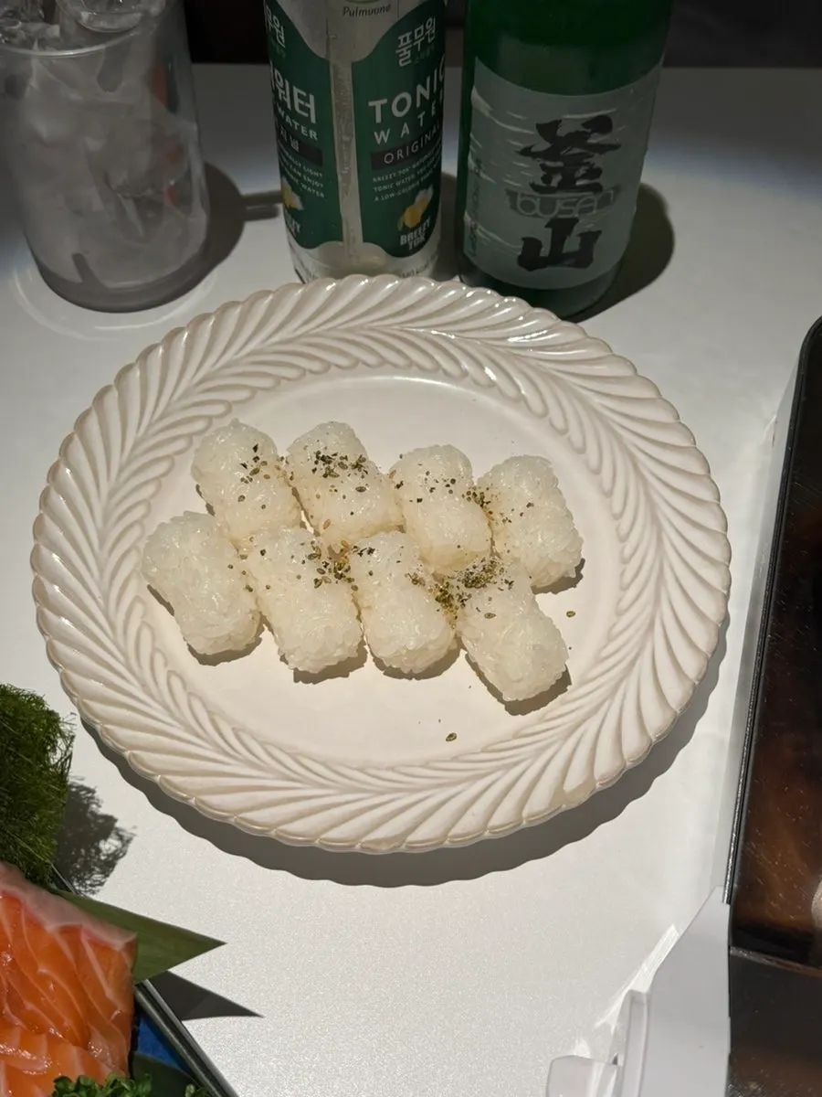Sushi rice ordered alongside the salmon sashimi