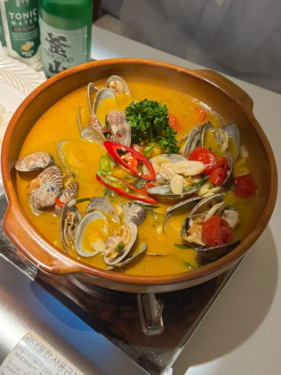 Clam wine broth loaded generously with clams