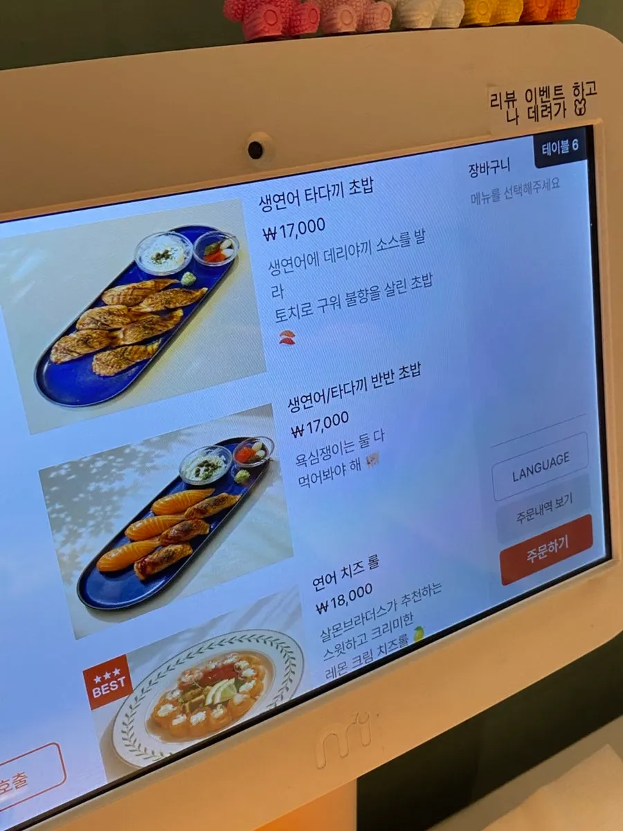Menu page with salads and salmon steak