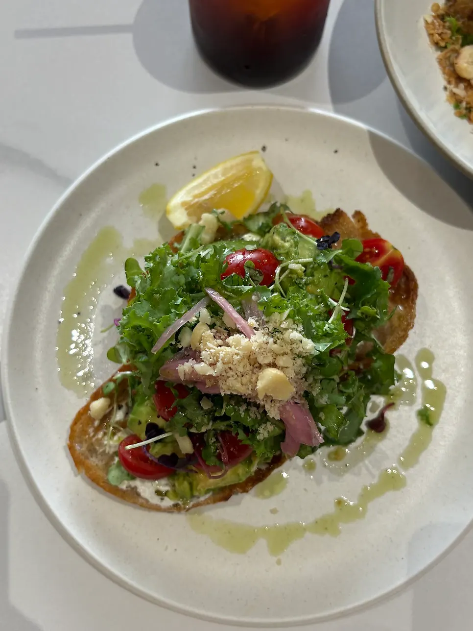 Brunch topped with poached egg and salmon