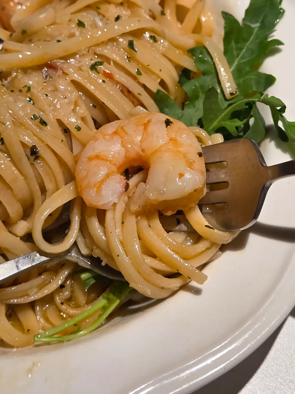 Aglio olio eaten with shrimp