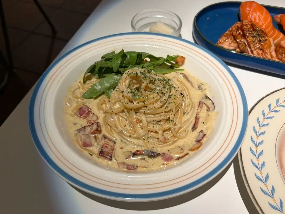 A plate of truffle cream pasta