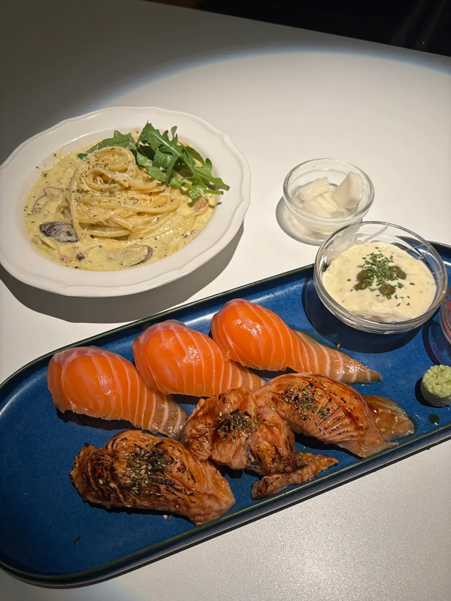 Close-up of a bite-sized piece of salmon sushi