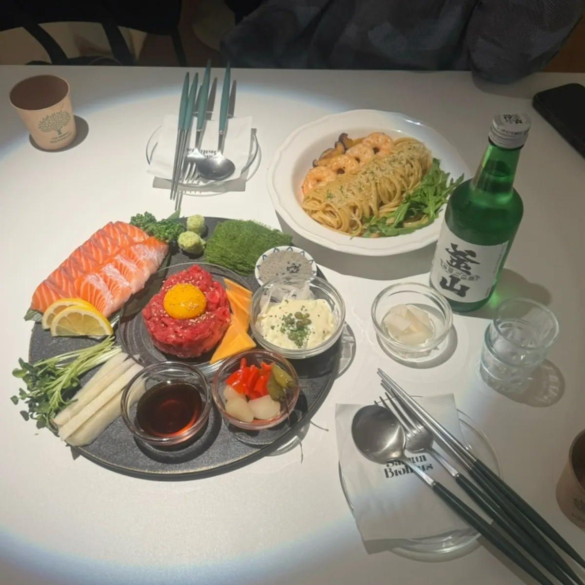 Half salmon, half beef tartare and aglio e olio