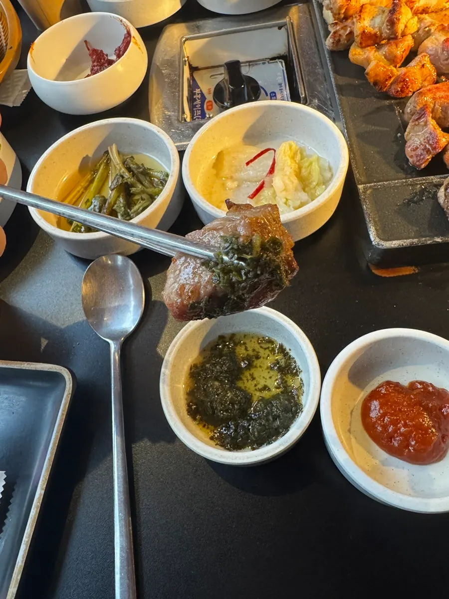 Grilled meat served with side vegetables