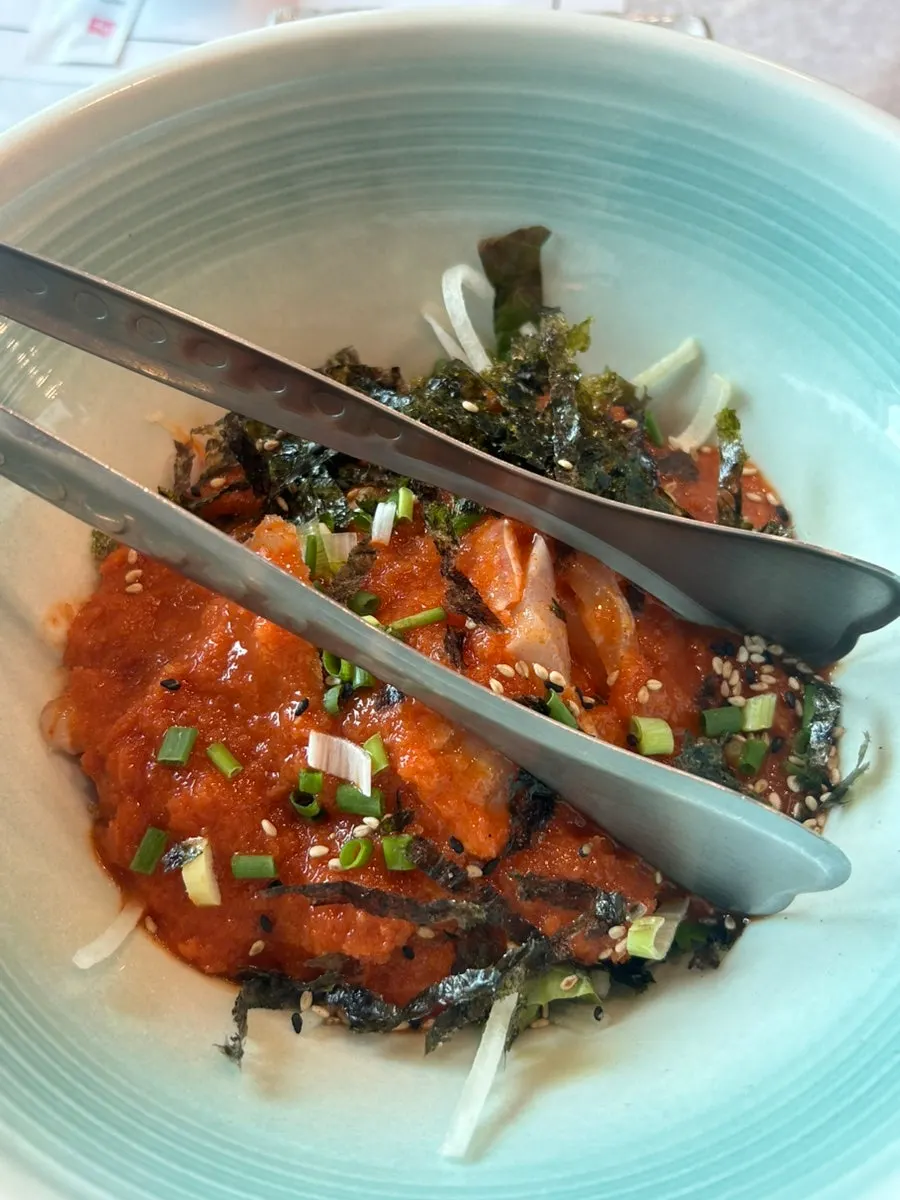 Table setting with sashimi sauce and aged kimchi