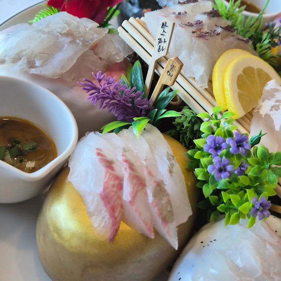 Sashimi plate with fish name tags