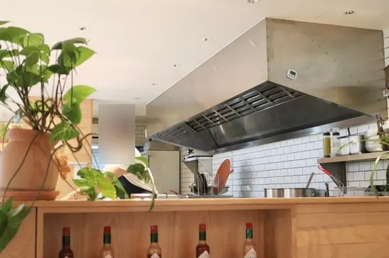 Open kitchen visible from the seating area
