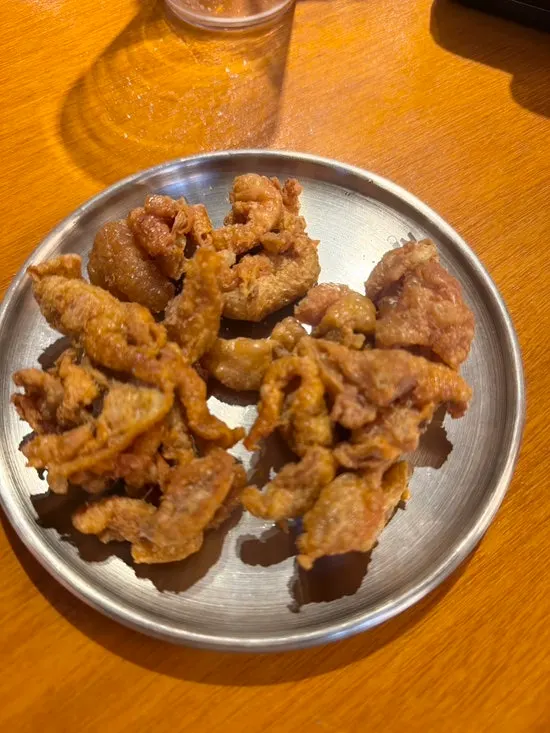 Fried chicken skin received as a free side