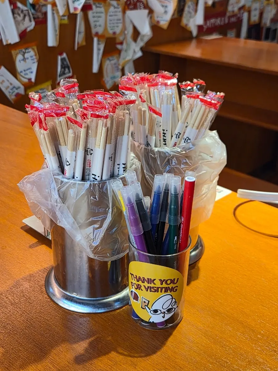 Pen and notebook placed on the table