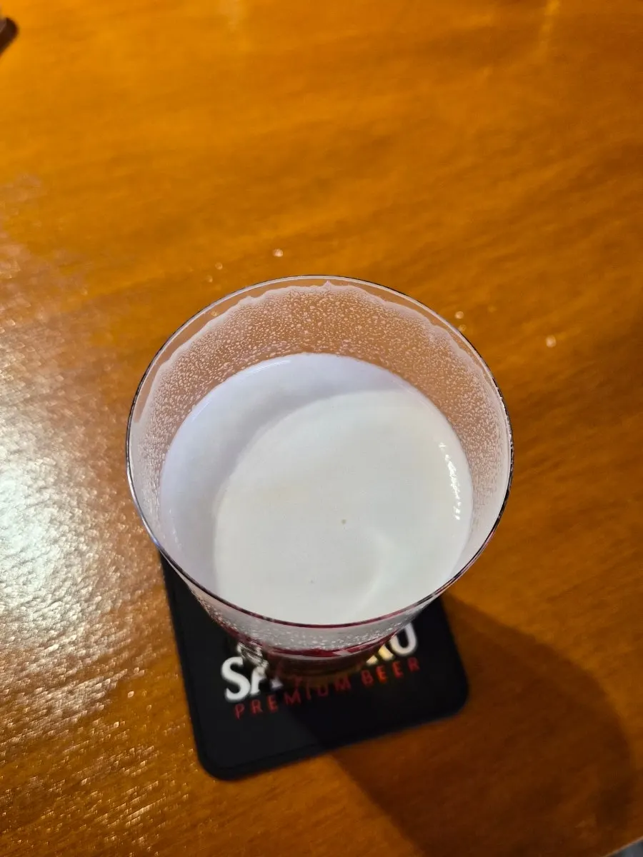 Draft beer in a thin glass