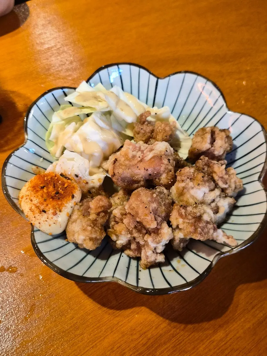 Osaka chicken served with draft beer