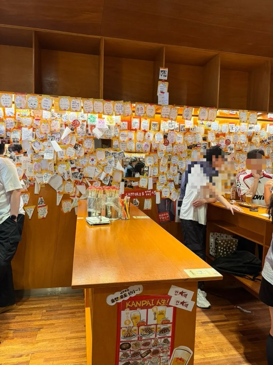 Lively atmosphere inside the standing bar