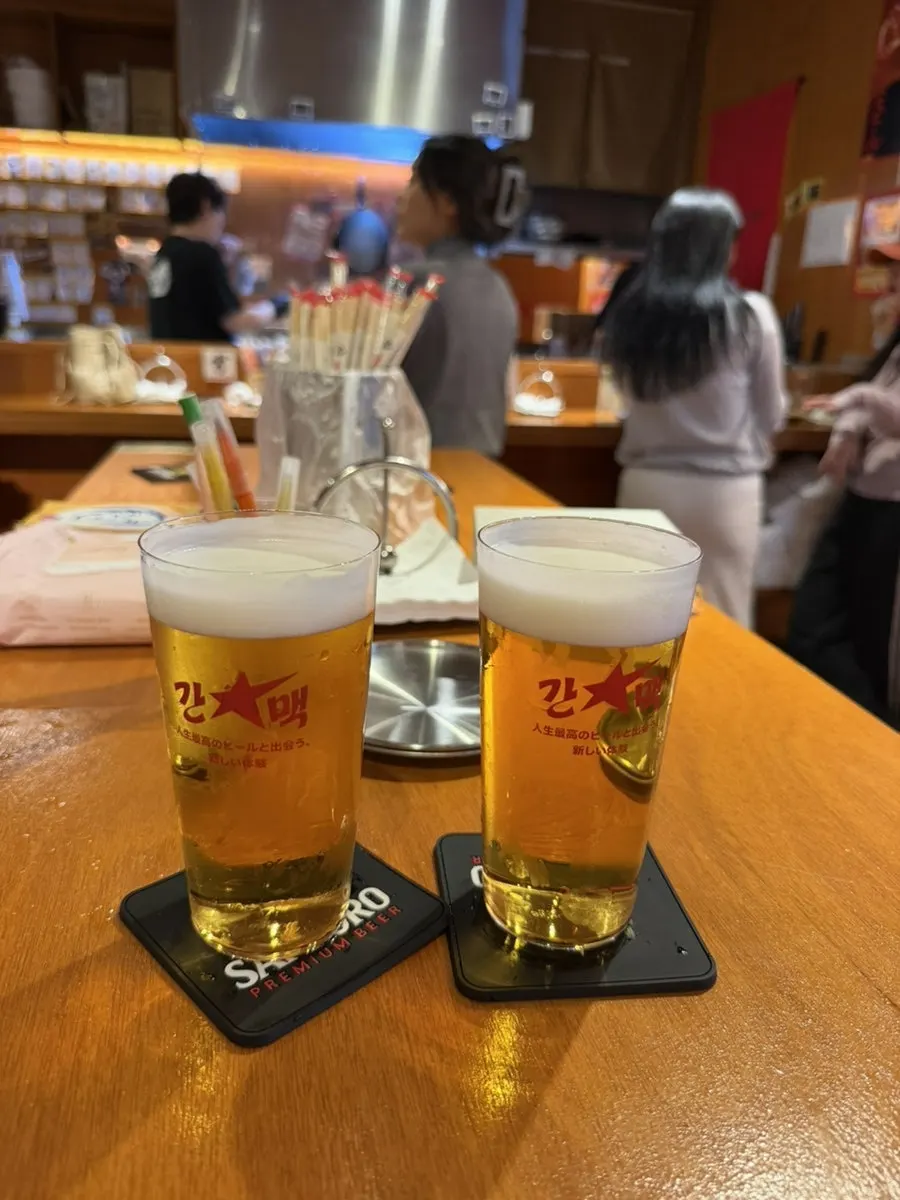A glass of Sapporo draft beer