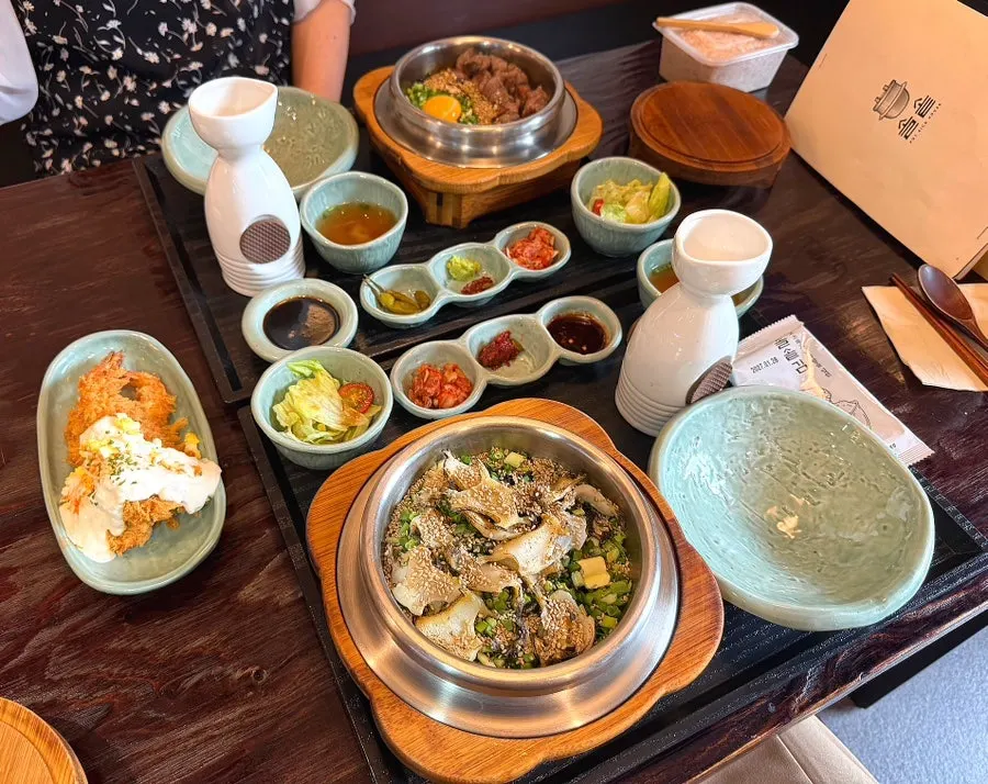 A full spread of pot rice and fried shrimp