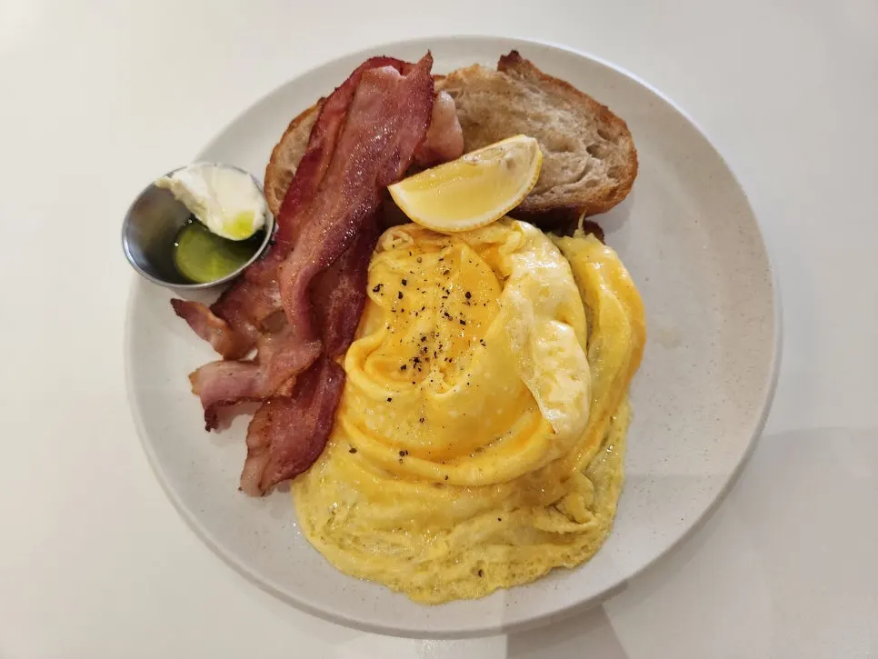 A plate of bacon scramble toast