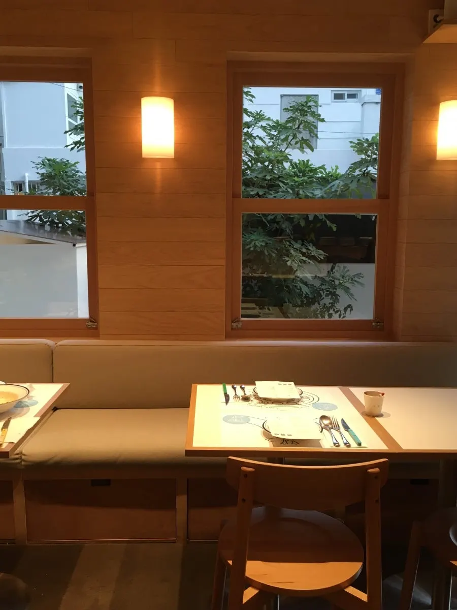 Tables for two to four people at Extra Mile