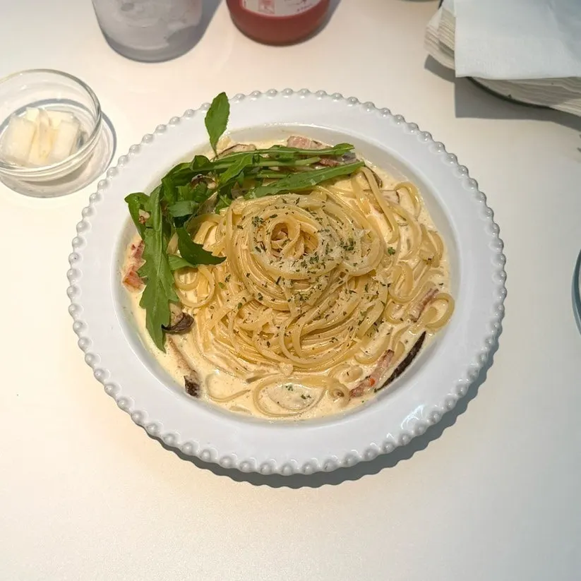 A plate of thick truffle cream pasta