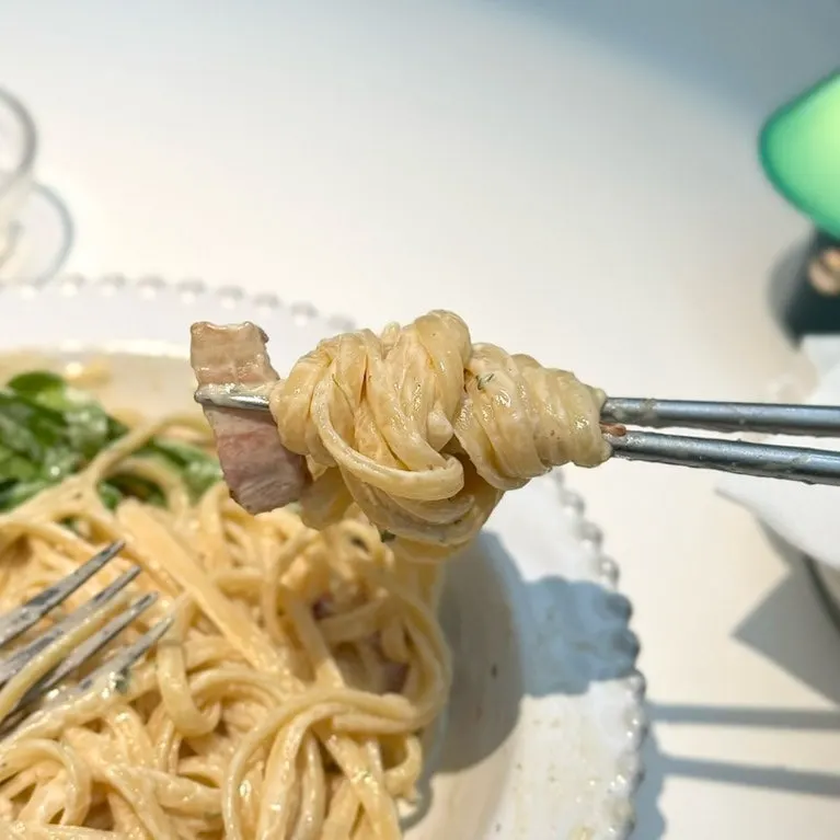 Pasta with rich cream and bacon combined