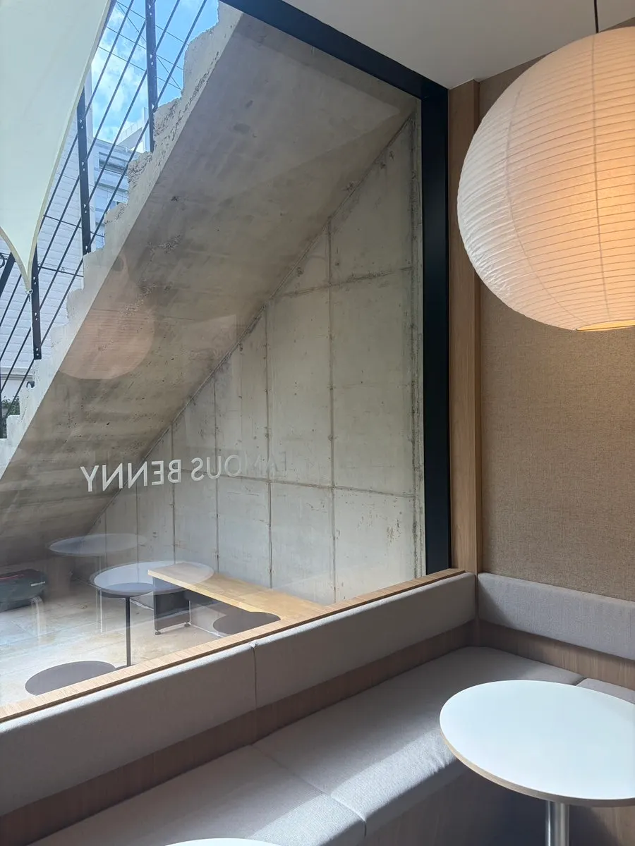 Brunch café seating lit by large windows