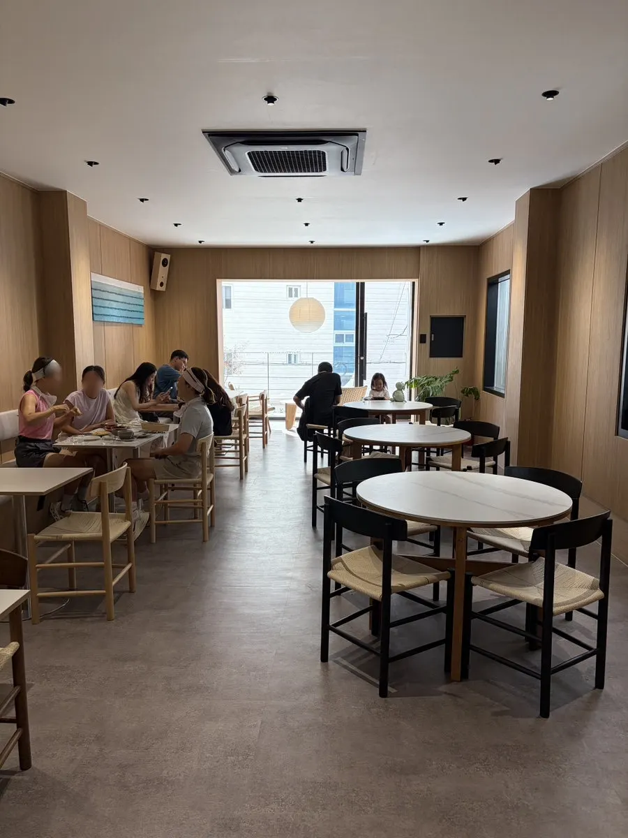 Interior of the brunch café with guests seated