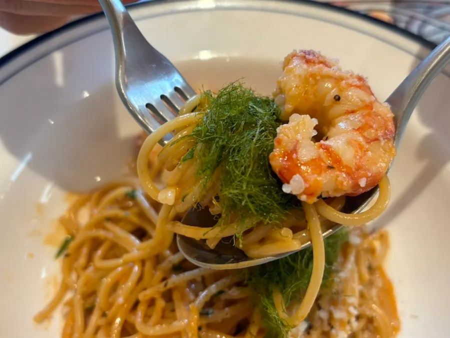 Forkful of bisque cream pasta lifted up