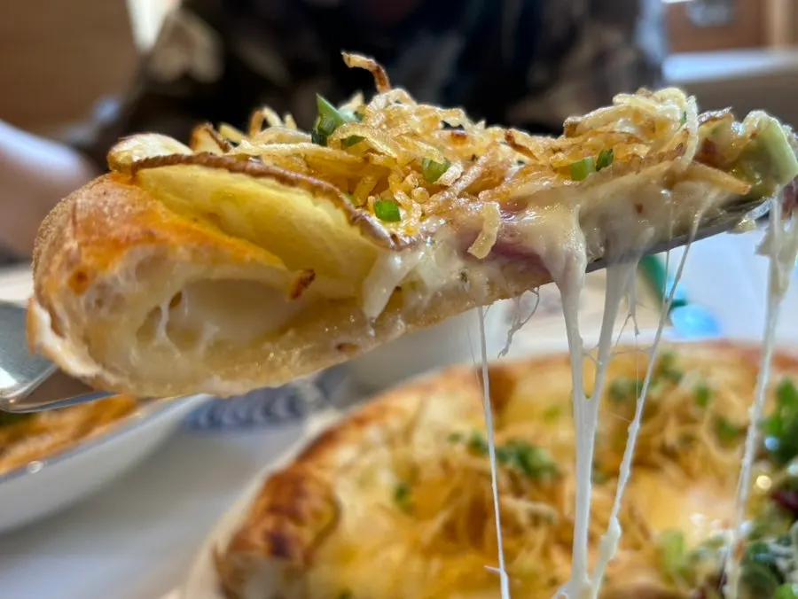 Potato pizza topped with two-baked potato and bacon