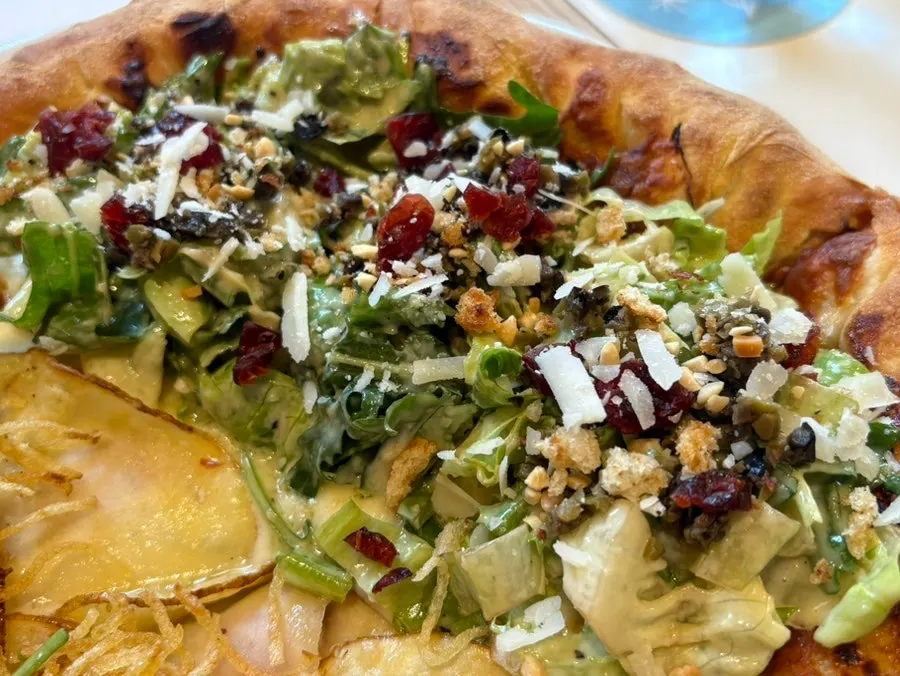 Salad pizza piled high with European vegetables