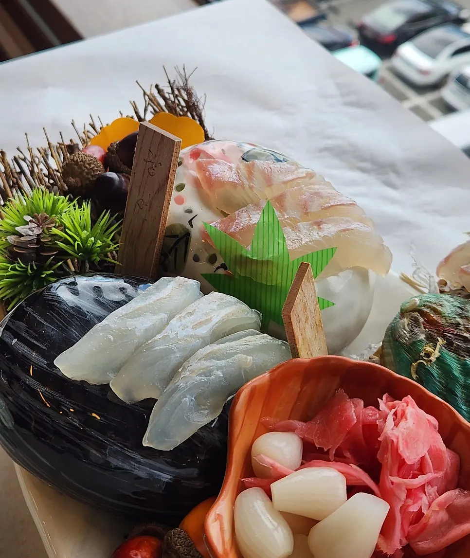 Flatfish sashimi wrapped with perilla leaf and aged kimchi