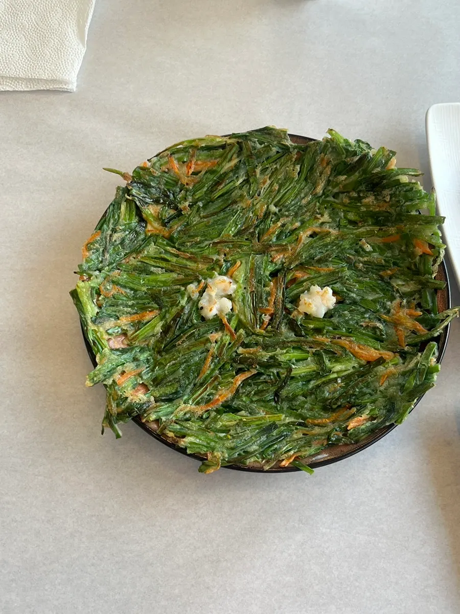 Green onion pancake served as an extra dish