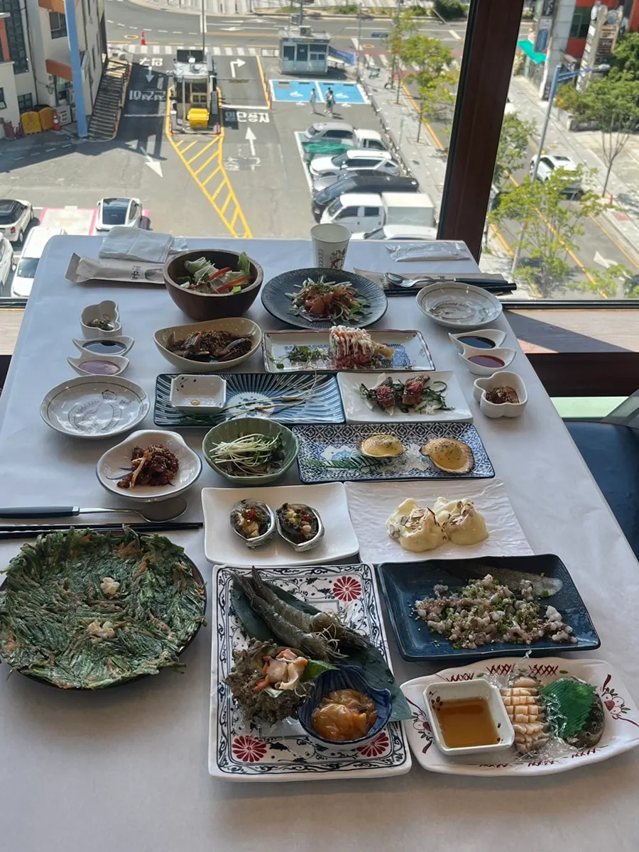 Live shrimp sashimi, live octopus, and abalone sashimi spread