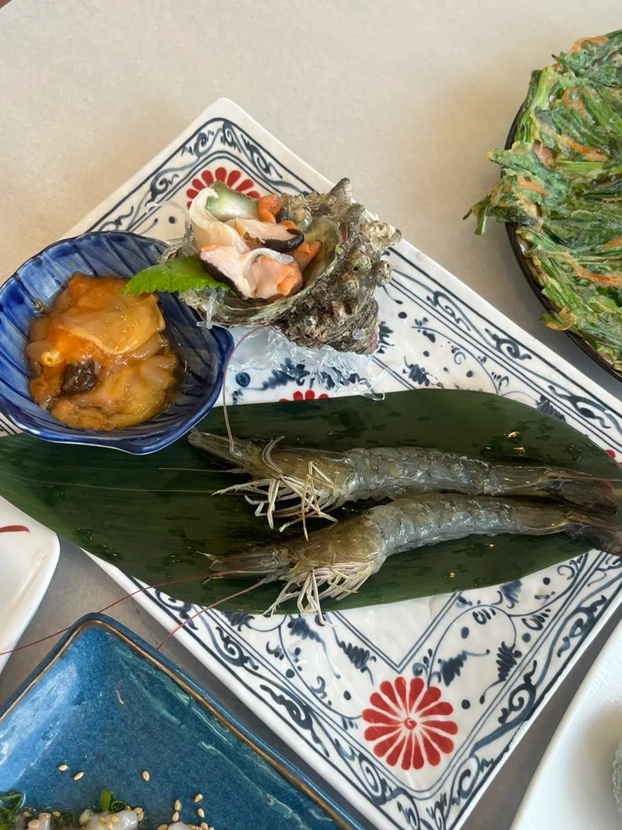 Full dachi set spread laid out before the sashimi arrives