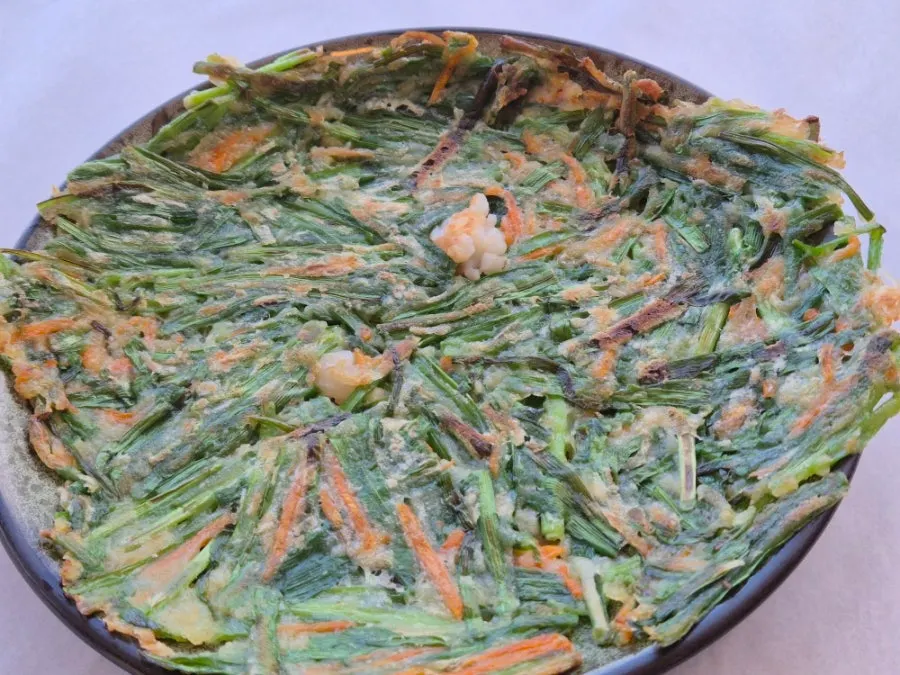 Thin, crispy buchujeon (chive pancake) fried at Gwanganda