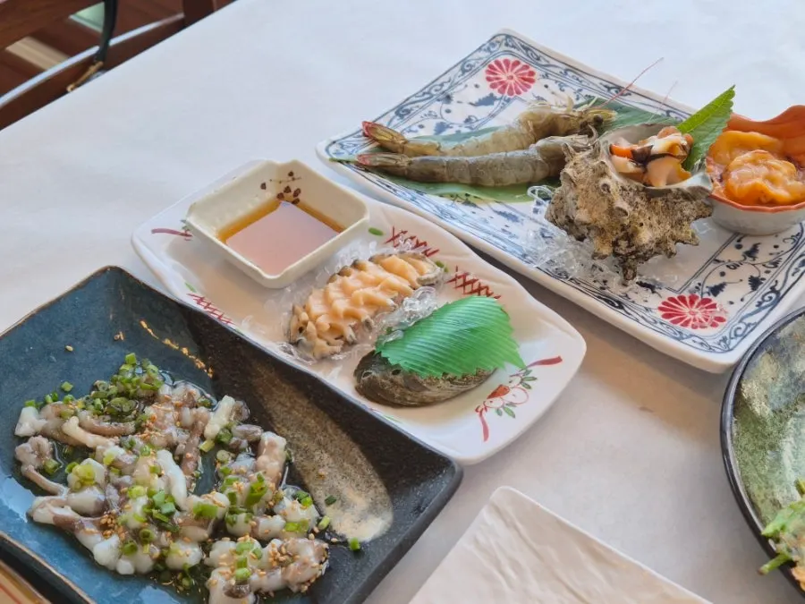 A plate with five kinds of seafood