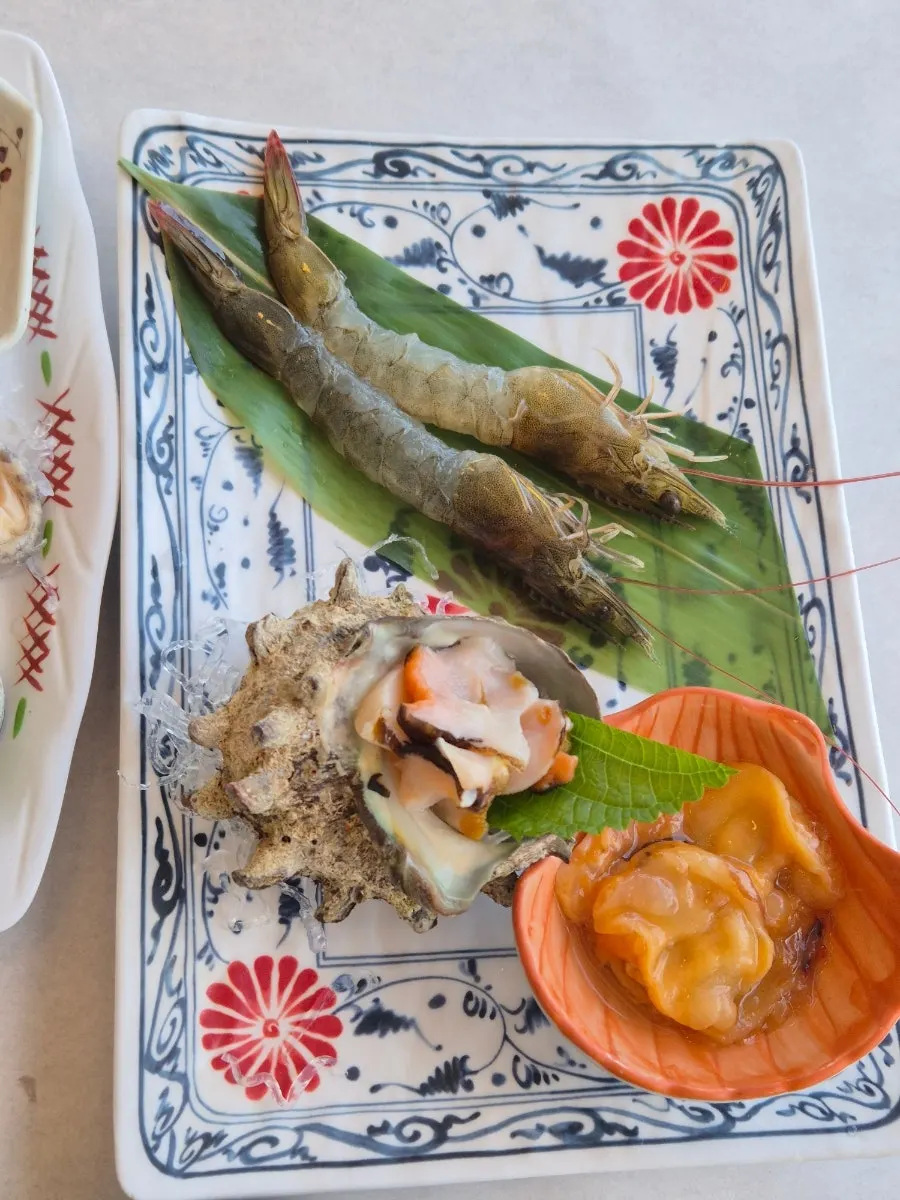 A seafood plate with live octopus and sea squirt