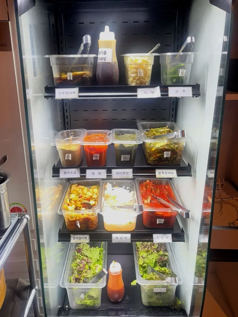 Self-serve bar with wrap vegetables and banchan