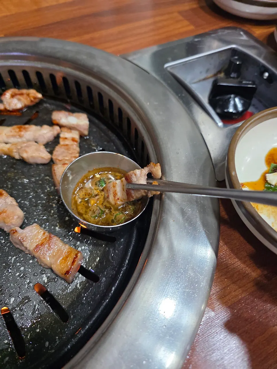 Pork belly dipped in myeoljeot sauce
