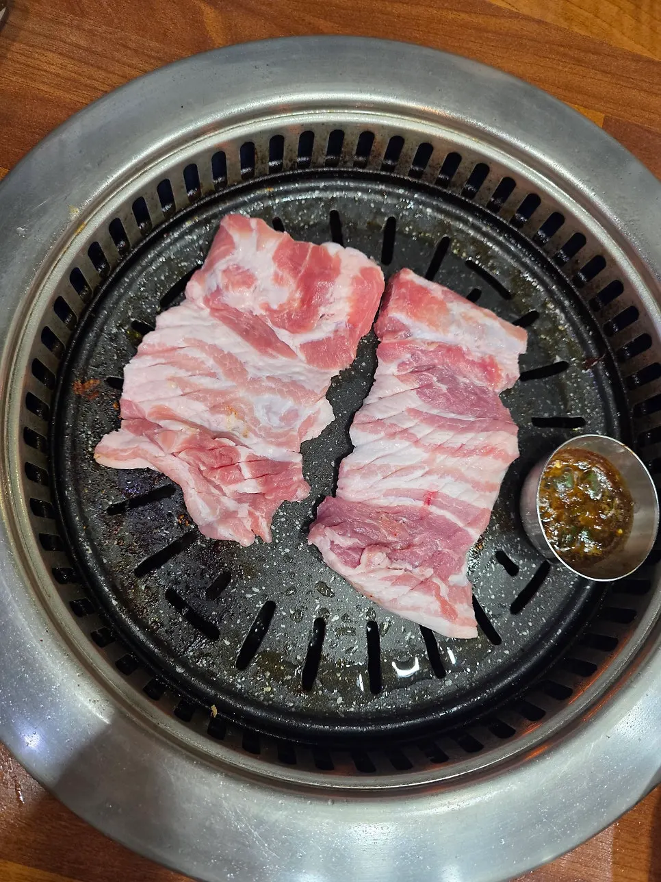 Plate of freshly ordered Jeju short ribs