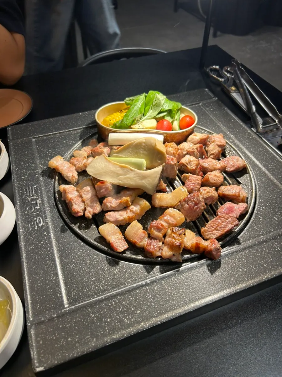 A piece of grilled aged pork belly