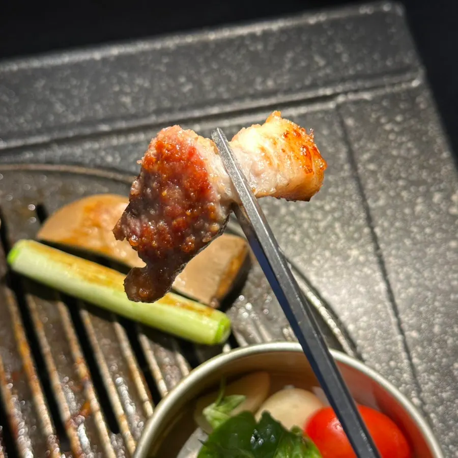 The signature pork neck, grilled tender