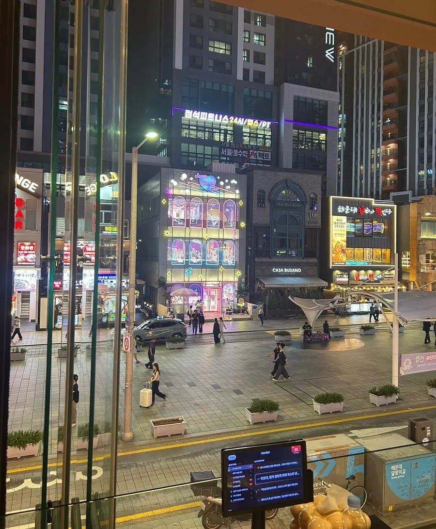 View of the Gwang-anmok Haeundae Branch dining room under soft lighting