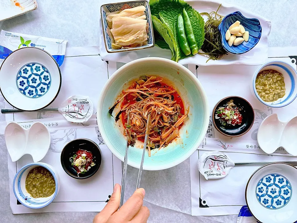 Table spread including abalone innards porridge